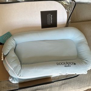 Brand new light blue dock a tot deluxe+